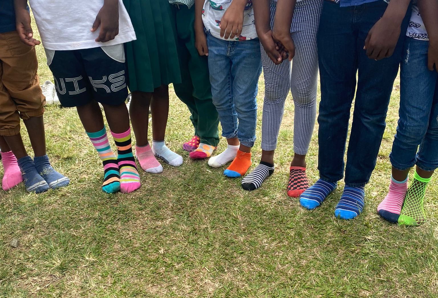 Pupils wear colourful socks for World Down Syndrome Day